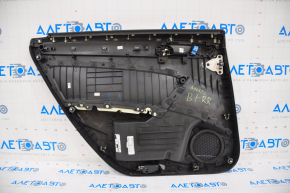Door trim card rear right VW Passat b7 12-15 USA black, scratch, cracks in crepe
