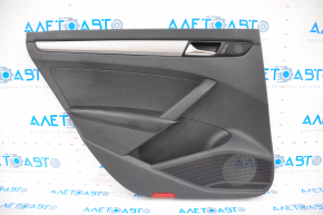 Door trim card rear left VW Passat b7 12-15 USA black, dented on top, cracks in the fastener