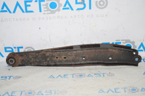 Rusty lower rear right control arm for a Subaru Outback 15-19