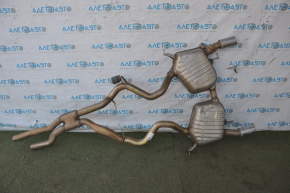 The rear muffler with barrels of the BMW 335i e92 07-11 is dented