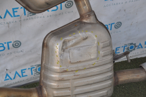 The rear muffler with barrels of the BMW 335i e92 07-11 is dented
