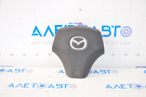 Black steering wheel airbag for the driver's side of the Mazda6 2003-2008.