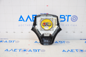 Black steering wheel airbag for the driver's side of the Mazda6 2003-2008.
