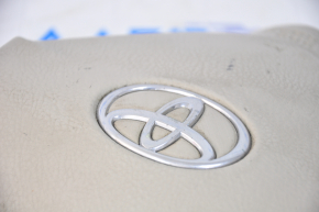 Steering wheel cover Toyota Solara 2.4 04-08 beige, scratches on the emblem