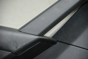 Door trim card rear left VW Passat b7 12-15 USA black with gray insert leather, armrest leather, molding black under carbon, broken crepe, worn, for dry cleaning
