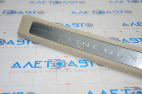 Door sill trim front left Lincoln MKZ 13-16 beige, bumps, scratches