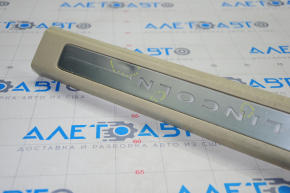 Door sill trim front left Lincoln MKZ 13-16 beige, bumps, scratches