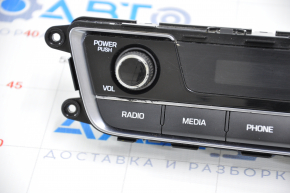 Hyundai Sonata 15-17 clock panel with radio control, crack in overlay, chrome chipped