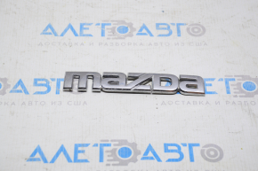 Mazda CX-7 06-09 trunk door emblem with "Mazda" inscription