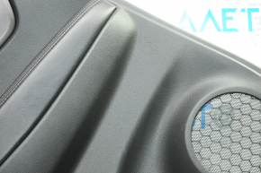 Door trim card rear left Nissan Rogue 14-16 black with black insert plastic, molding graphite gloss, armrest leather, scratches, bump