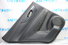 Door trim card rear left Nissan Rogue 14-16 black with black insert plastic, molding under carbon gloss, armrest leather, scratches, creased