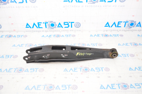 The lower rear left control arm of a Subaru Forester 14-18 SJ has a torn silent block.