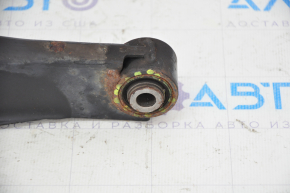 The lower rear right control arm of a Subaru Forester 14-18 SJ has a torn silent block.