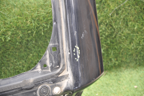 The tailgate of a Honda CRZ 11-16 is bare, the hinge mounting bolt is torn off.