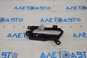 Inner rear left door handle for a 1995 Hyundai Sonata (USA)
