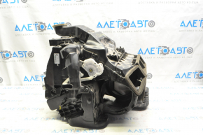 The bare heater housing of a 1920 Nissan Rogue is black.