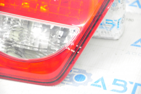 Light inside trunk lid left Toyota Sequoia 08-17 cracks