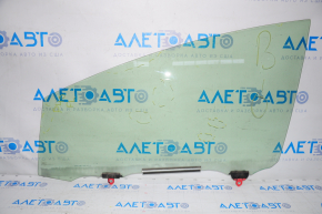 Glass door front left Toyota Prius V 12-17 scratches