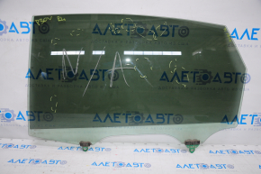 Glass door rear left Toyota Prius V 12-17 scratches