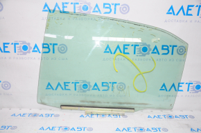 Glass door rear left Toyota Camry v40 scratches