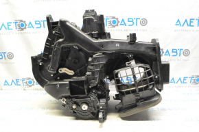 The bare heater housing of the Jeep Cherokee KL 14-18