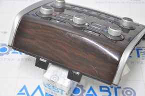 Climate control and audio control Nissan Pathfinder 13-16 under navigation, wood scratches on the trim