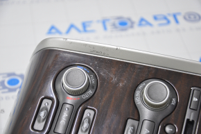 Climate control and audio control Nissan Pathfinder 13-16 under navigation, wood-like scratched and rubbed overlay
