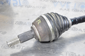 The front left half-shaft of a Nissan Murano z51 09-14 has a torn inner CV joint boot.