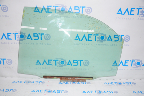 Glass door rear left Toyota Camry v30 2.4 scratches