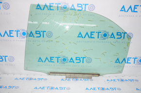 Glass door rear left Toyota Camry v30 2.4 scratches