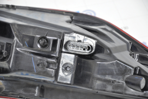 Light outer wing right Infiniti QX50 19-20 cracks in glass