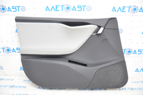 Door trim card front left Tesla Model S 12-15 pre-rest black, with gray insert, with backlight, swollen leather, bumps on chrome