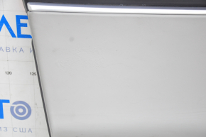 Door trim card front left Tesla Model S 12-15 pre-rest black, with gray insert, with backlight, swollen leather, bumps on chrome