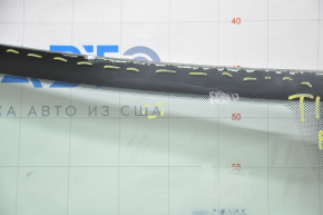 Windshield VW Tiguan 09-18 air on edge, scratch, sand