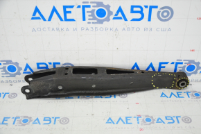 The lower rear left transverse control arm of the Subaru Forester 19-24 SK is dented, with microcracks.