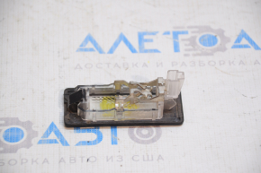 Trunk lid number plate light left VW Passat b7 12-15 USA halogen