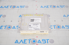 Tesla Model S 12-15 pre-restoration air suspension control unit dent