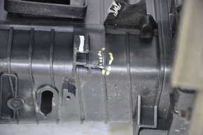 The stove body is bare Tesla Model S 12-15 pre-restoration, the fasteners are broken