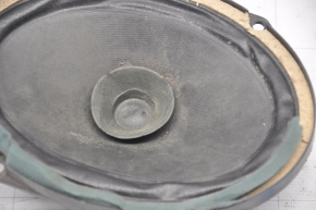 Front left door speaker Mazda3 03-09 is pressed
