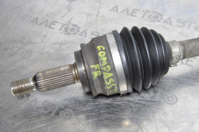 The front right half shaft of a Jeep Compass 11-16 2.0 CVT FWD is short and has a torn boot.