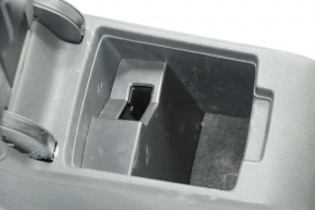 Central console armrest and cup holders VW Jetta 11-18 USA leather black, under armrest, under lock release button, under multimedia unit type 1, for dry cleaning, scratches
