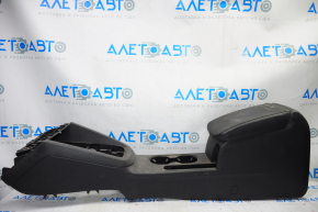 Central console armrest and cup holders VW Jetta 11-18 USA leather black, under armrest, under lock release button, under multimedia unit type 2, scratches