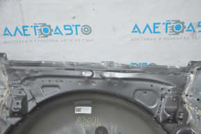 The trunk trough of Toyota Prius 30 10-15 is dented