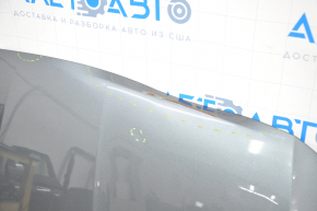 The hood is bare VW Jetta 19-24 graphite LD7X dented in the front, rust, bumps