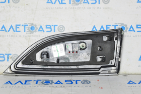 Inner taillight trunk lid left Chevrolet Volt 11-15 chipped plastic, needs polishing