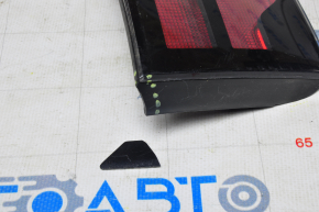 Inner taillight trunk lid left Chevrolet Volt 11-15 chipped plastic, needs polishing