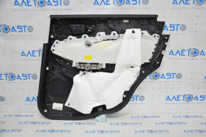 Door trim card rear left Ford Edge 15-18 black leather with beige insert plastic turned white, trim is worn