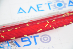 Brake light in rear spoiler Mazda CX-7 06-09 scratches