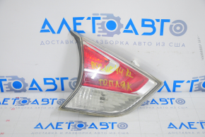 Light inside trunk lid left Nissan Rogue 14-16 water damage, needs polishing