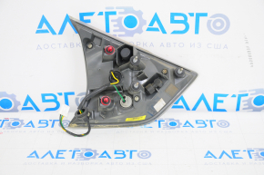 Light inside trunk lid right Nissan Rogue 14-16 water damage, needs polishing